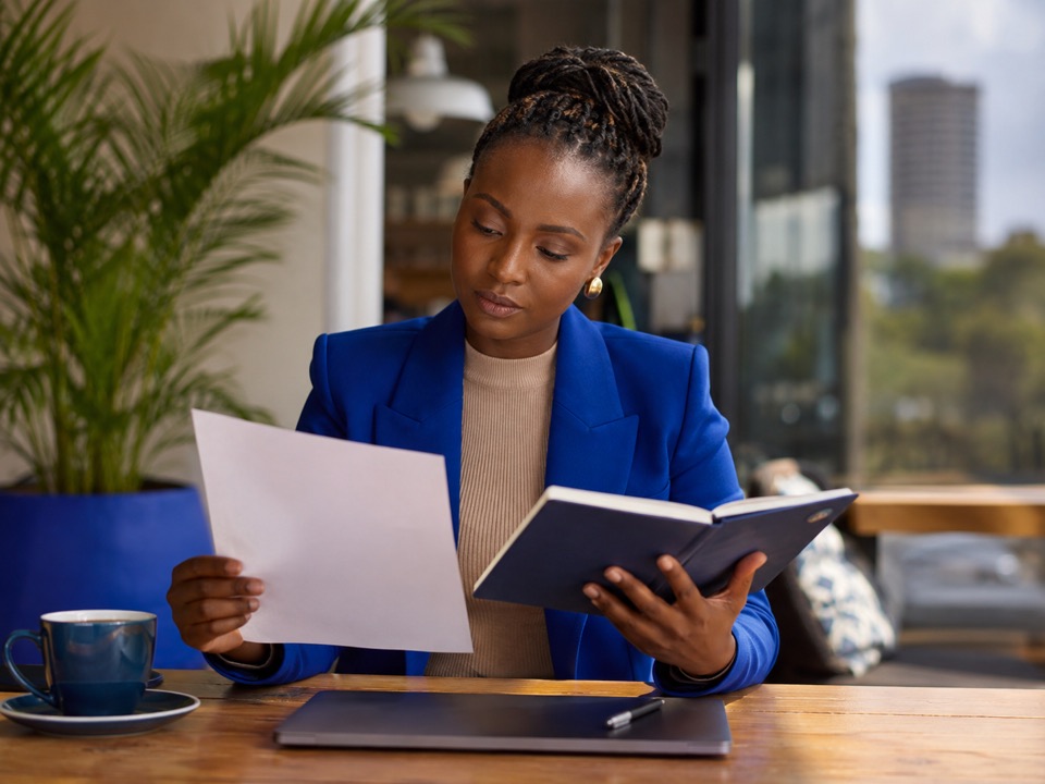 A professional reviewing an employment offer