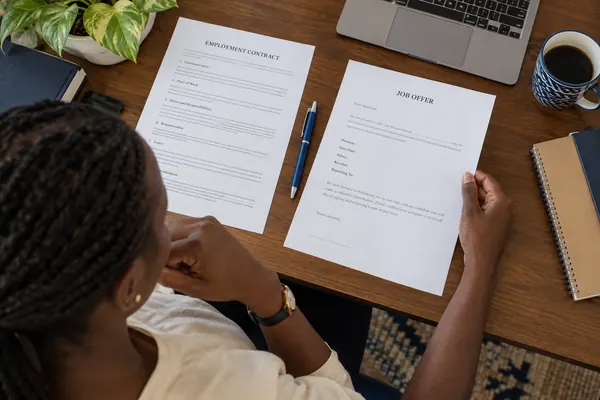 Worker comparing the terms in two employment documents