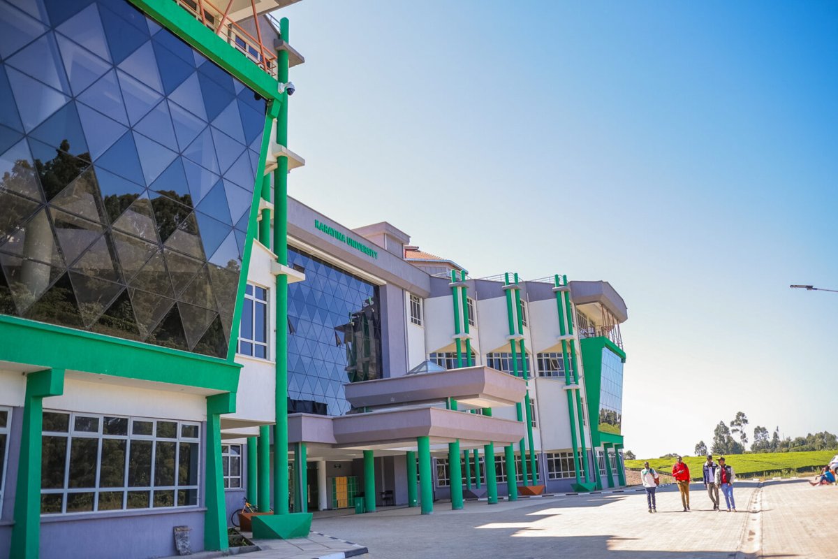 A new Karatina University building in green and white with glass facade